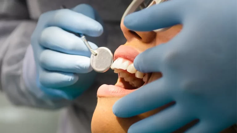 Woman getting her teeth cheacked